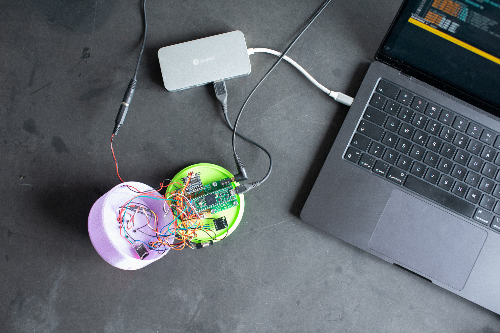 Sensory Anchor device prototype in use showing hands-on tactile interaction